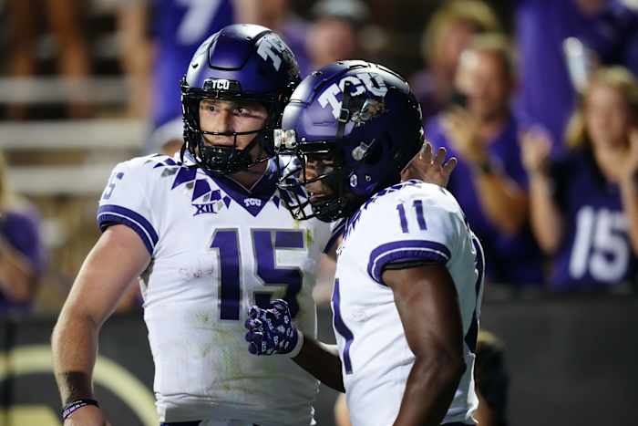 Sep 2, 2022; Boulder, Colorado, USA; TCU Horned Frogs wide receiver Derius Davis (11) celebrates his touchdown with quarterback Max Duggan (15) in the fourth quarter against the Colorado Buffaloes at Folsom Field. Mandatory Credit: Ron Chenoy-USA TODAY Sports